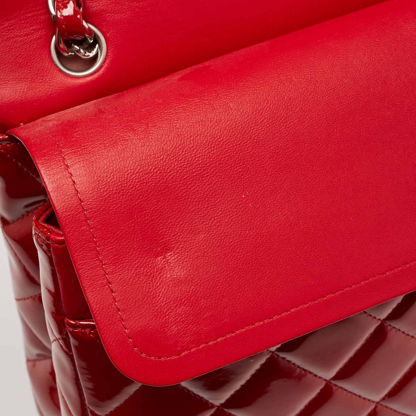CHANEL Red Quilted Patent Leather Maxi Classic Double Flap Bag