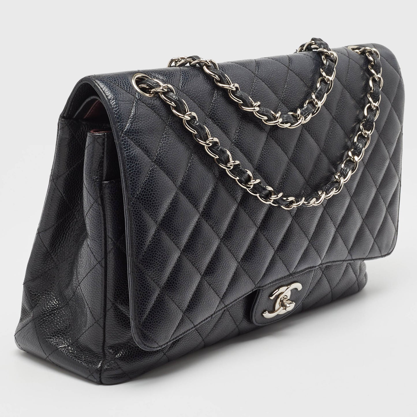 CHANEL Black Quilted Caviar Leather Maxi Classic Double Flap Bag