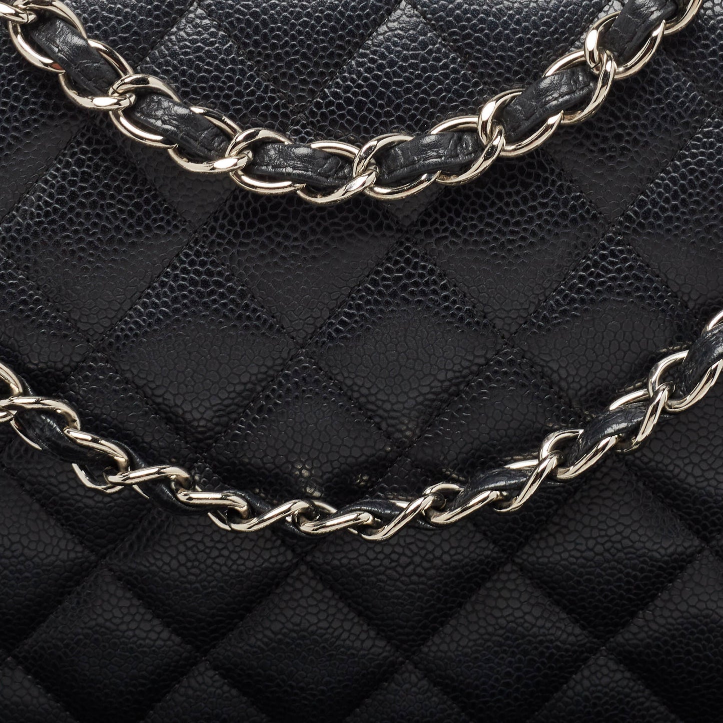 CHANEL Black Quilted Caviar Leather Maxi Classic Double Flap Bag