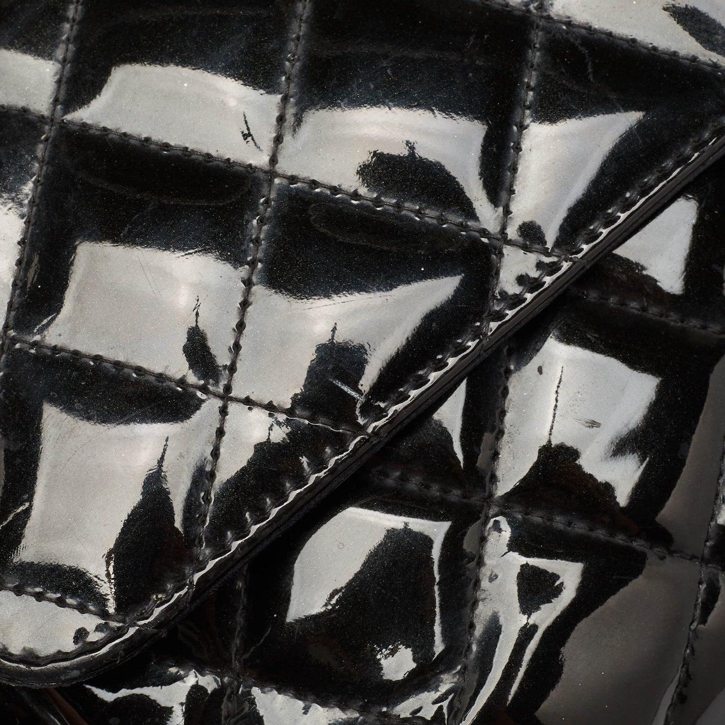 CHANEL Black Quilted Patent Leather Maxi Classic Single Flap Bag