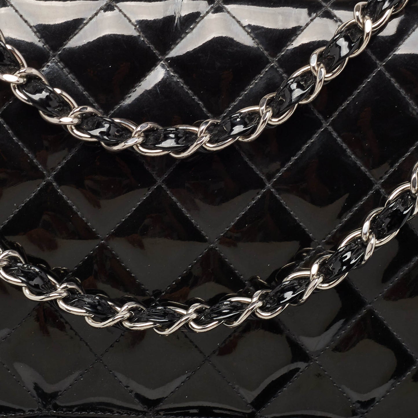CHANEL Black Quilted Patent Leather Maxi Classic Single Flap Bag