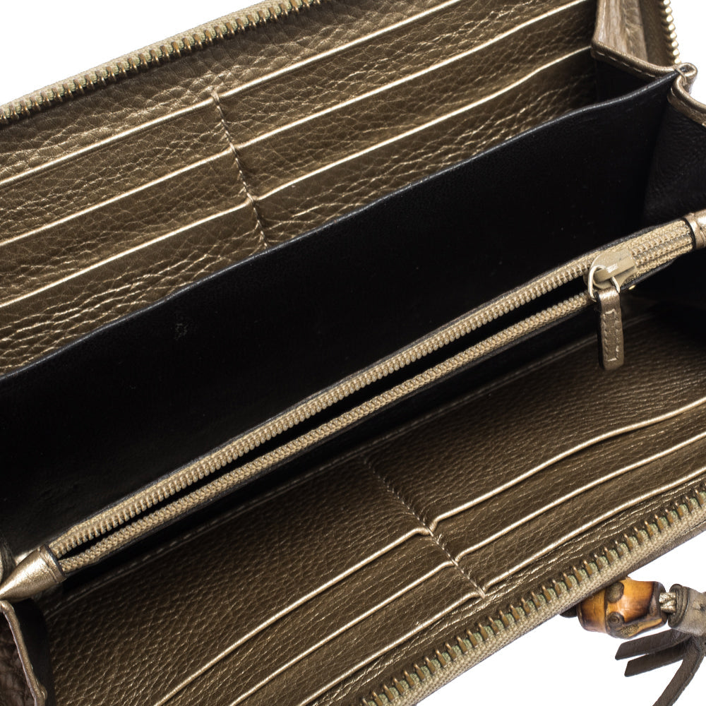 Luxury Gucci Gold Leather Bamboo Tassel Bow Zip Around Wallet