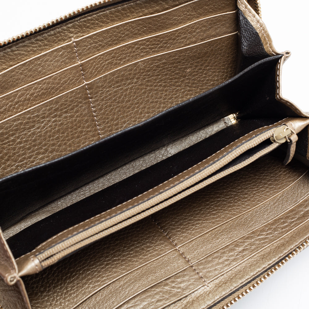 Luxury Gucci Gold Leather Bamboo Tassel Bow Zip Around Wallet