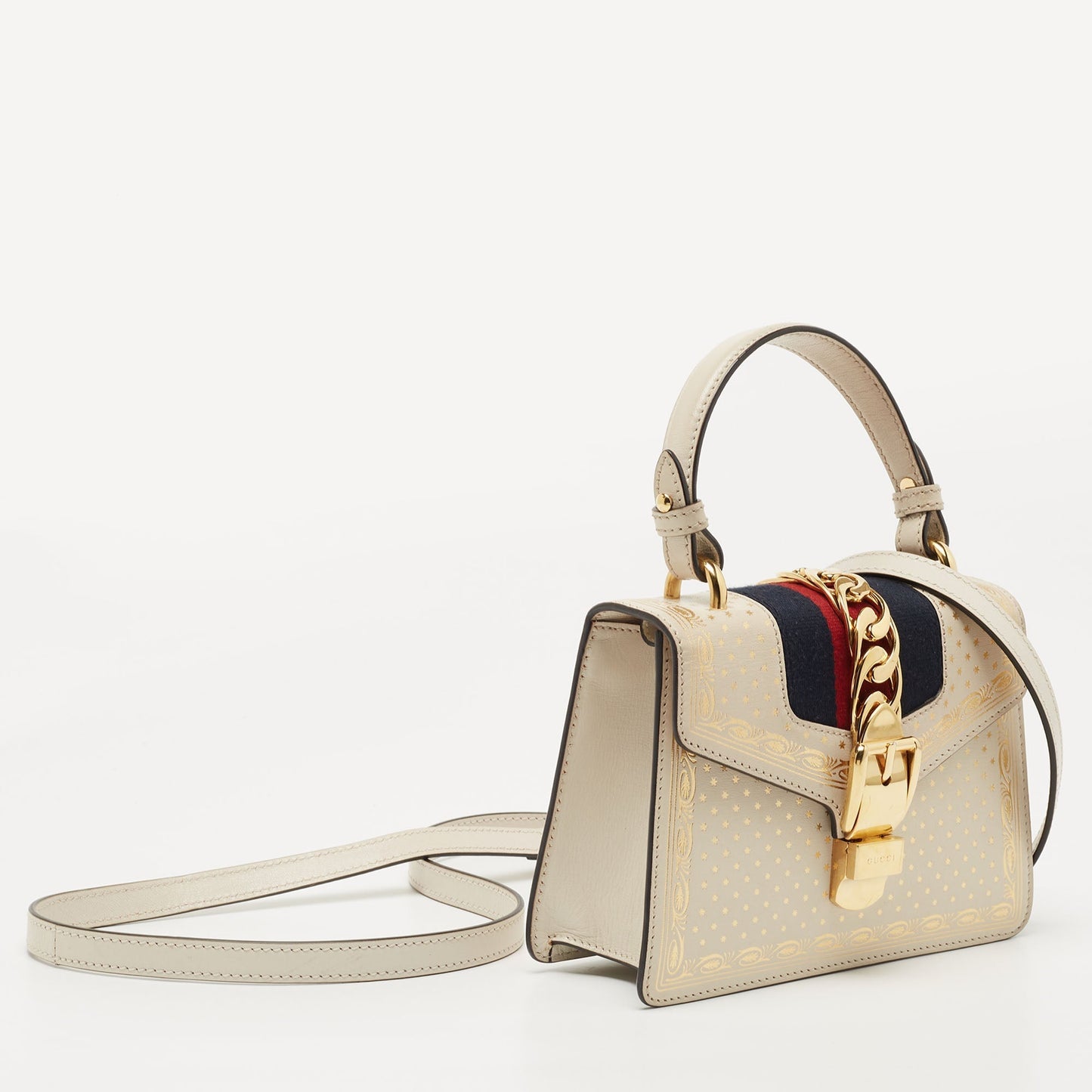 Luxury Gucci Off White Star Print Leather Mini Sylvie Top Handle Bag